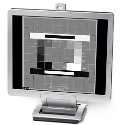 El monitorizador de luz ambiente Mavo-Max colocado sobre una pantalla.